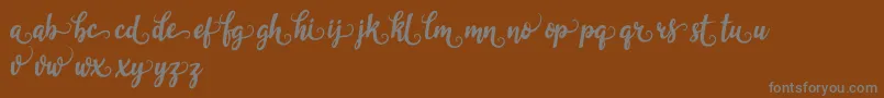 garlixbrown-Schriftart – Graue Schriften auf braunem Hintergrund