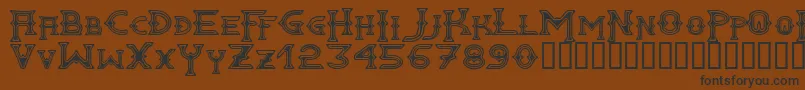 GAWAIN  -Schriftart – Schwarze Schriften auf braunem Hintergrund