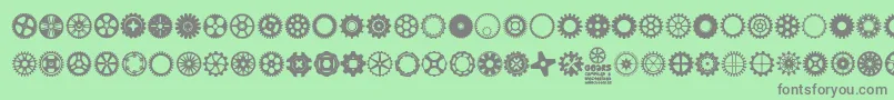 Gears Icons-fontti – harmaat kirjasimet vihreällä taustalla