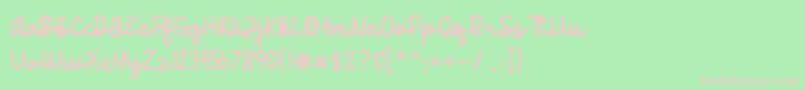 フォントGedang – 緑の背景にピンクのフォント