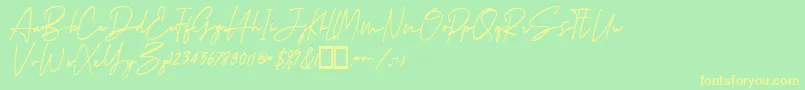 フォントGedangijo Regular – 黄色の文字が緑の背景にあります