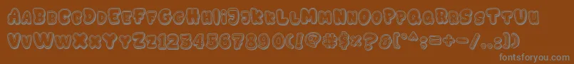 GEDEBOOG LINE-Schriftart – Graue Schriften auf braunem Hintergrund