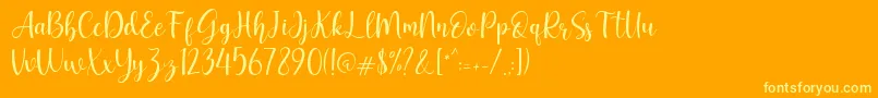 Geishela Font – Yellow Fonts on Orange Background
