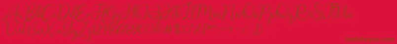 Geisty Demo-Schriftart – Braune Schriften auf rotem Hintergrund