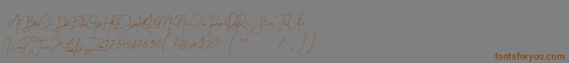 Gellattik Janggan Font – Brown Fonts on Gray Background