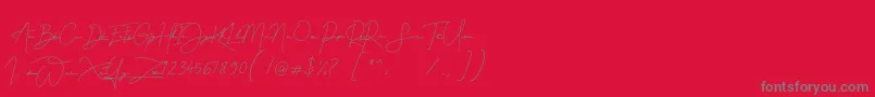 Gellattik Janggan-Schriftart – Graue Schriften auf rotem Hintergrund