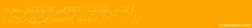 Gellattik Janggan Font – Yellow Fonts on Orange Background