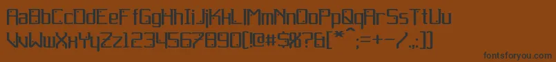 フォントGemcut – 黒い文字が茶色の背景にあります