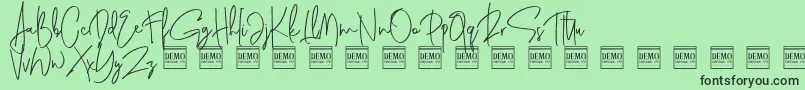 Шрифт genit demo – чёрные шрифты на зелёном фоне