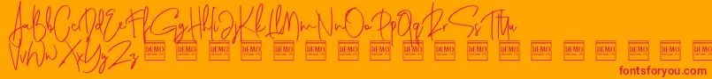 Czcionka genit demo – czerwone czcionki na pomarańczowym tle