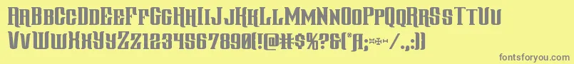 gentlemancaller-fontti – harmaat kirjasimet keltaisella taustalla
