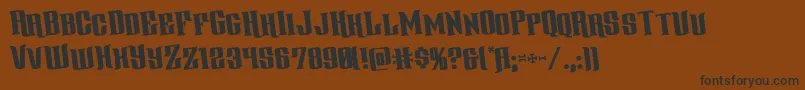 gentlemancallerrotate-Schriftart – Schwarze Schriften auf braunem Hintergrund