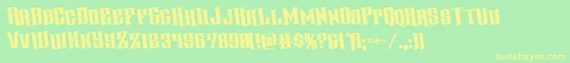 フォントgentlemancallerrotate – 黄色の文字が緑の背景にあります