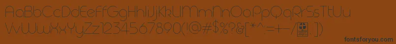 Geoma Thin Demo Font – Black Fonts on Brown Background