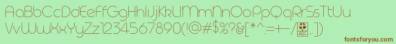 Шрифт Geoma Thin Demo – коричневые шрифты на зелёном фоне
