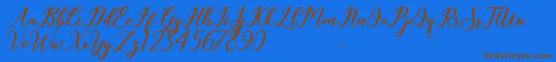 Geralyn Font – Brown Fonts on Blue Background