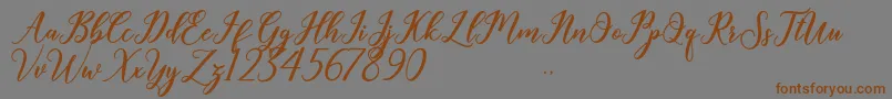 Geralyn Font – Brown Fonts on Gray Background