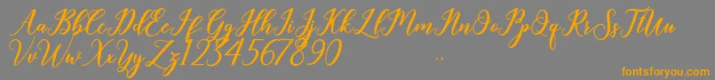 Geralyn Font – Orange Fonts on Gray Background