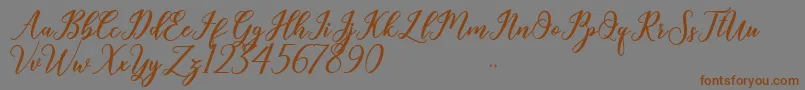 Geralyn-Schriftart – Braune Schriften auf grauem Hintergrund