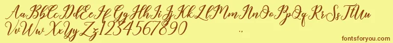 Czcionka Geralyn – brązowe czcionki na żółtym tle