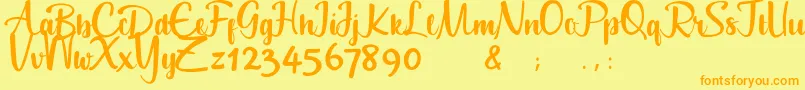 Geuceu-Schriftart – Orangefarbene Schriften auf gelbem Hintergrund