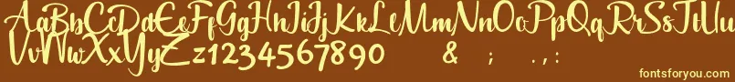 Geuceu-Schriftart – Gelbe Schriften auf braunem Hintergrund
