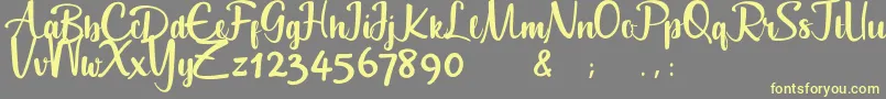 Geuceu Font – Yellow Fonts on Gray Background