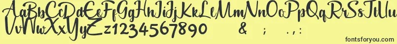 Geuceu Font – Black Fonts on Yellow Background