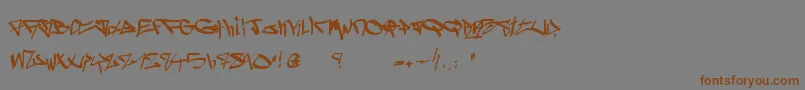 フォントGhetto Blasterz – 茶色の文字が灰色の背景にあります。
