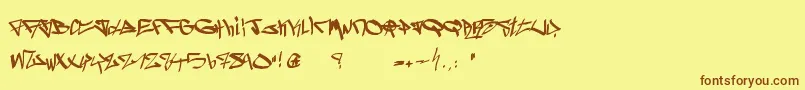 フォントGhetto Blasterz – 茶色の文字が黄色の背景にあります。