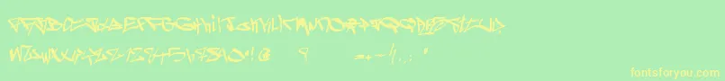 フォントGhetto Blasterz – 黄色の文字が緑の背景にあります