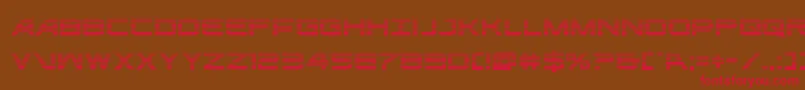 フォントghostclangrad – 赤い文字が茶色の背景にあります。