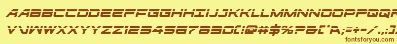 フォントghostclanlaserital – 茶色の文字が黄色の背景にあります。