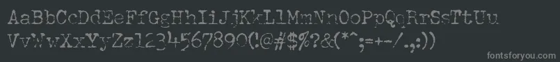フォントDumboldtypewriterLight – 黒い背景に灰色の文字