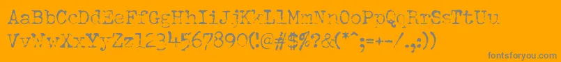 DumboldtypewriterLight-Schriftart – Graue Schriften auf orangefarbenem Hintergrund