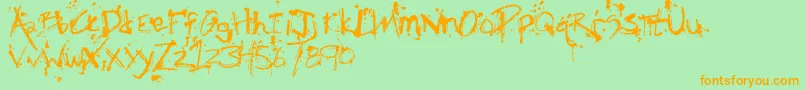 SmObscenism-Schriftart – Orangefarbene Schriften auf grünem Hintergrund