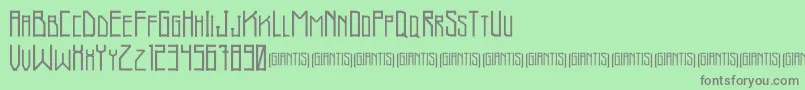 Fonte Giantis Demo – fontes cinzas em um fundo verde