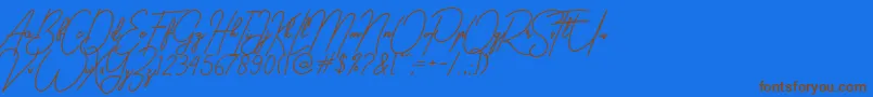 gilberta Font – Brown Fonts on Blue Background