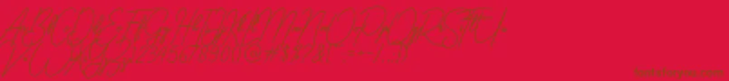 gilberta Font – Brown Fonts on Red Background