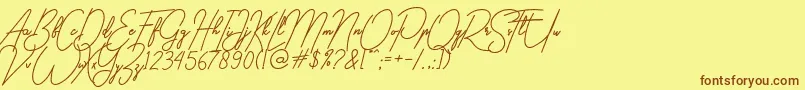 gilberta Font – Brown Fonts on Yellow Background