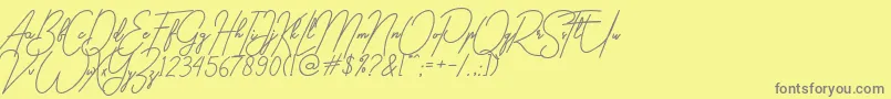gilberta Font – Gray Fonts on Yellow Background