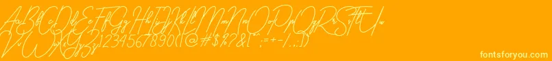 gilberta Font – Yellow Fonts on Orange Background