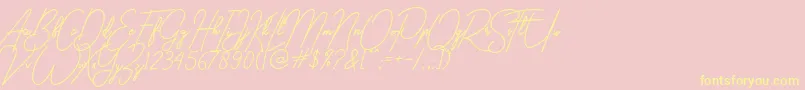 gilberta Font – Yellow Fonts on Pink Background