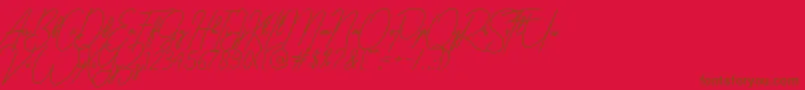 gilberta-Schriftart – Braune Schriften auf rotem Hintergrund