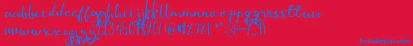 GinaAnn Font – Blue Fonts on Red Background