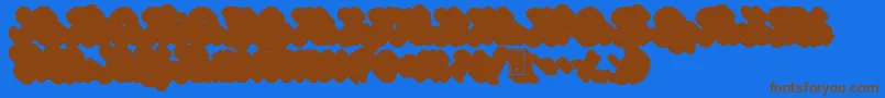 GinchiestShadow-Schriftart – Braune Schriften auf blauem Hintergrund