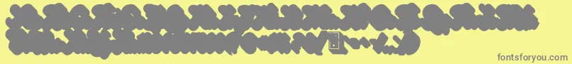 フォントGinchiestShadow – 黄色の背景に灰色の文字