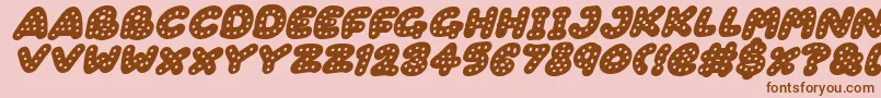 Gingerbread Italic-fontti – ruskeat fontit vaaleanpunaisella taustalla