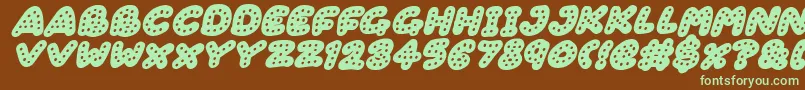 Gingerbread Italic-fontti – vihreät fontit ruskealla taustalla