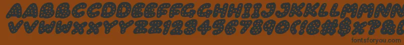 Шрифт Gingerbread Italic – чёрные шрифты на коричневом фоне